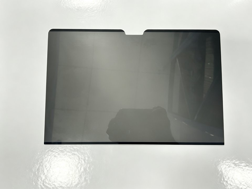 MacBook magnetic privacy screen film, dark smoke finish with camera cutout